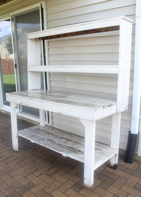 "Before" Multi-Use Outdoor Furniture: Old, Beat-Up Potting Bench Turned Party Serving Station | Paint Color-Anonymous Grey and Stain Color is Golden Pecan | Delightfully Noted #miniwax #sherwinwilliams