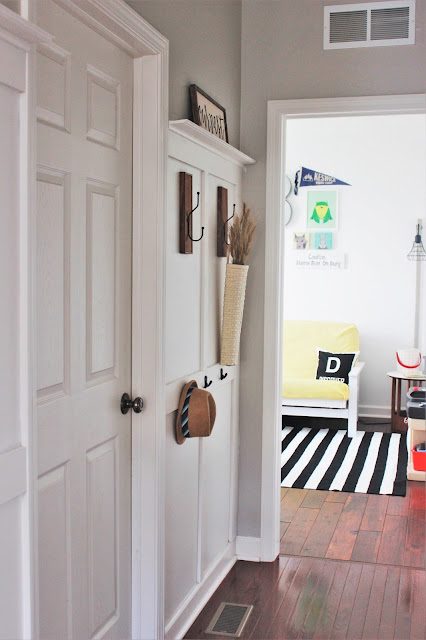 This could be the answer to an organized entryway or drop zone! How to Build a Board and Batten Coat Rack Wall