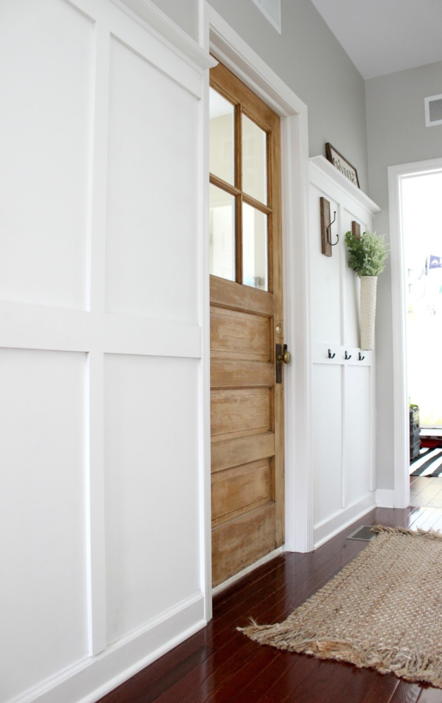 Wow! Replacing a standard laundry room door with an old, vintage door adds so much character and charm!